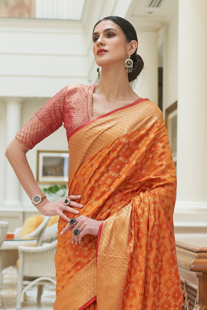 Yam Orange Exquisite Patola Silk Saree with Handloom Weaving