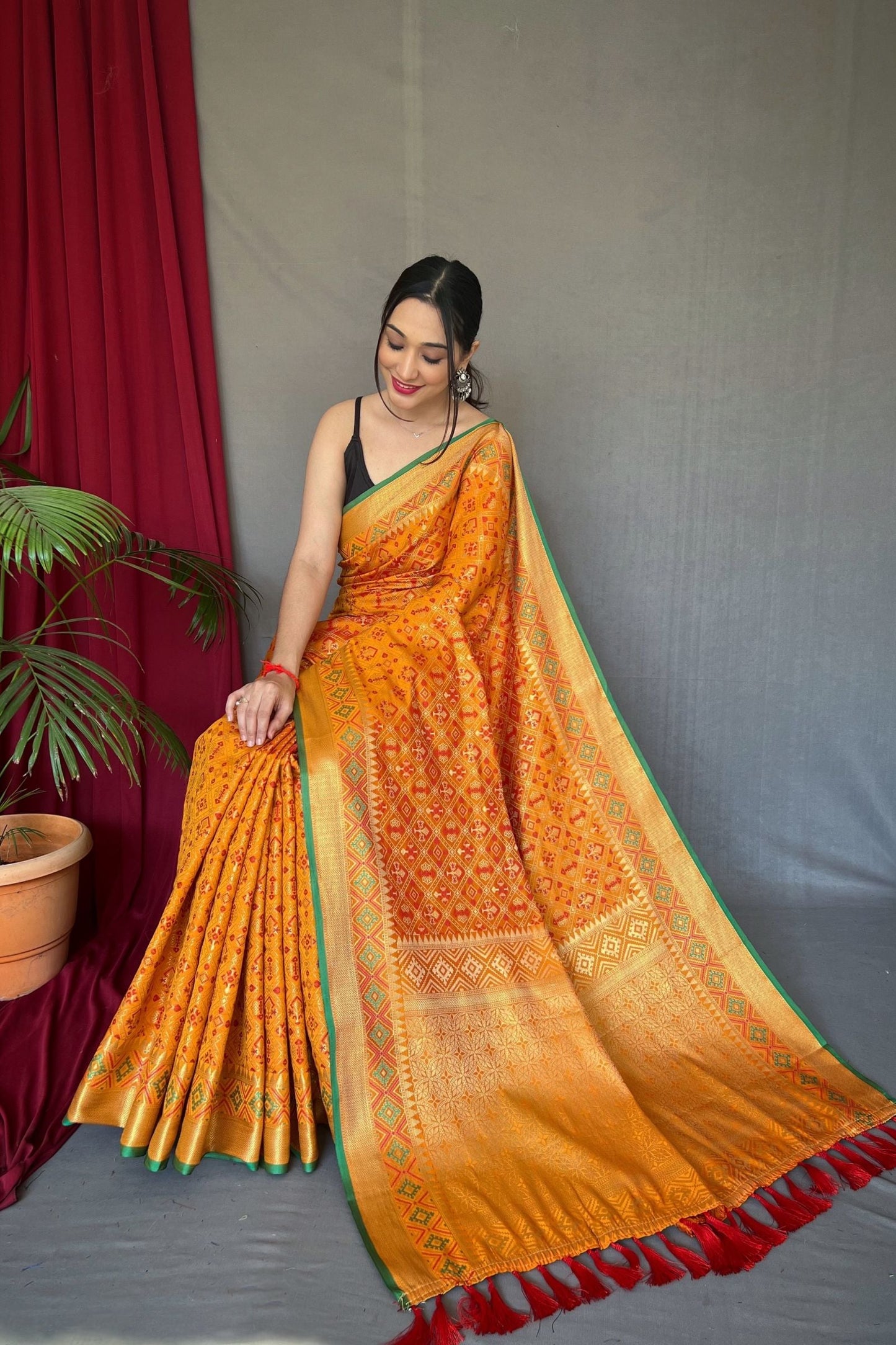 Chrome Yellow Meenakari Zari Weaving Patola Silk Saree
