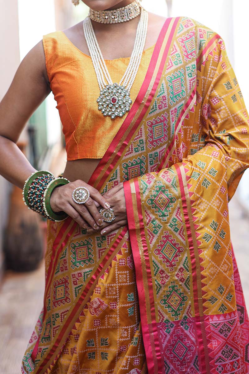 Turmeric Yellow Zari Woven Patola Silk Saree